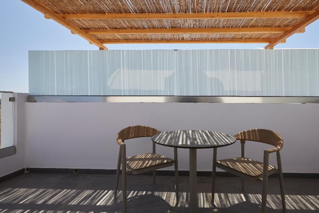 Sea Breeze Santorini Beach Resort, Curio Collection b Hilton photo 5
